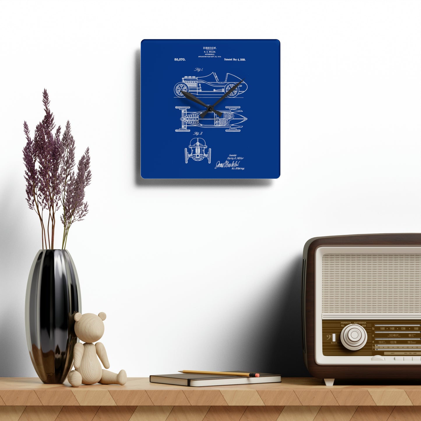 1920s Blue race car patent design clock with acrylic finish, inspired by Harry Miller's original design, perfect for office or man cave decor.