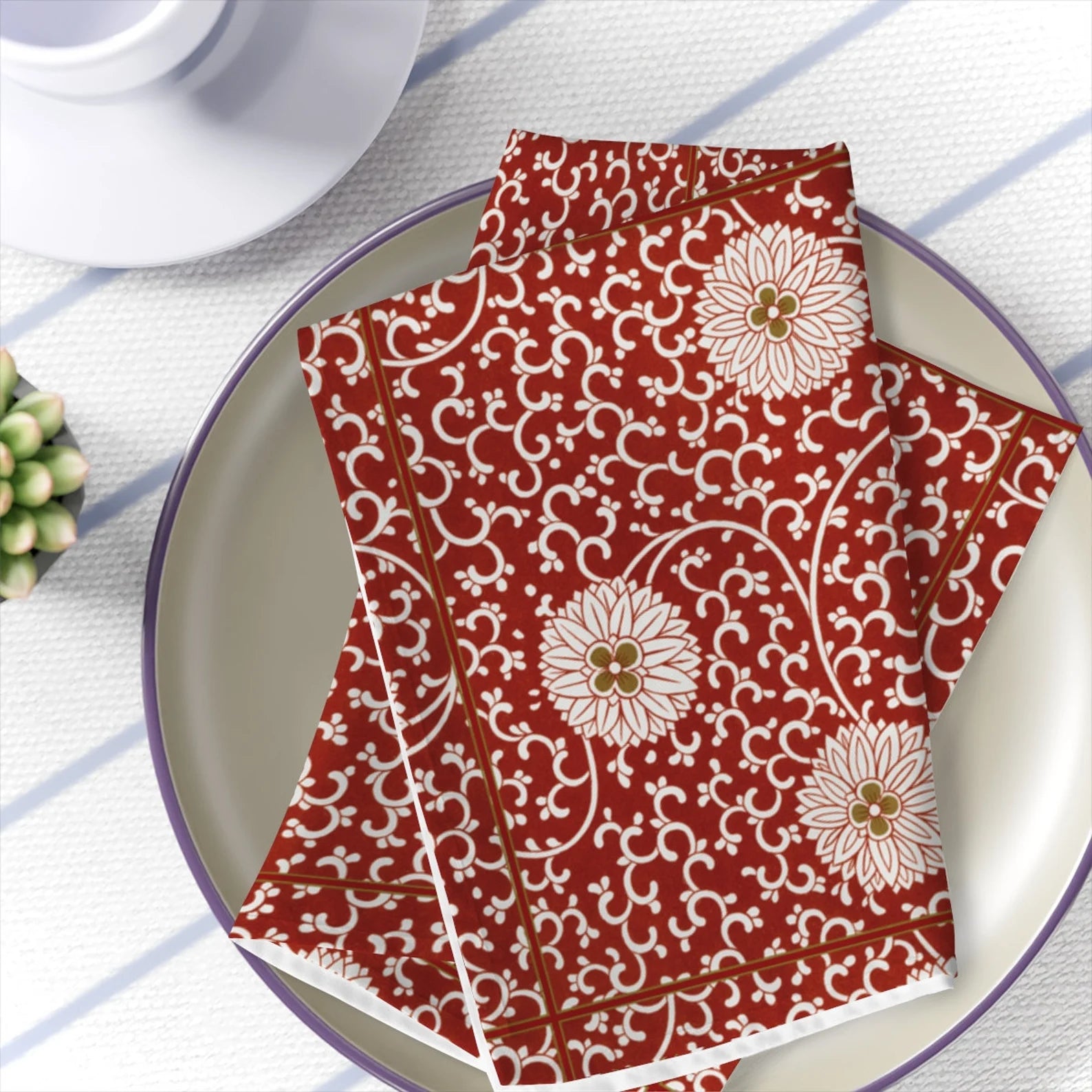 Festive Blossom Cloth Napkins in red with gold accents, perfect for holiday table settings and special gatherings.